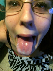 Nubie girlfriend in glasses licks sperm..