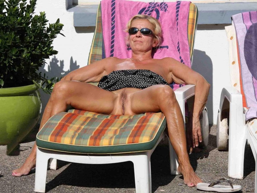 Mature nude sunbathing